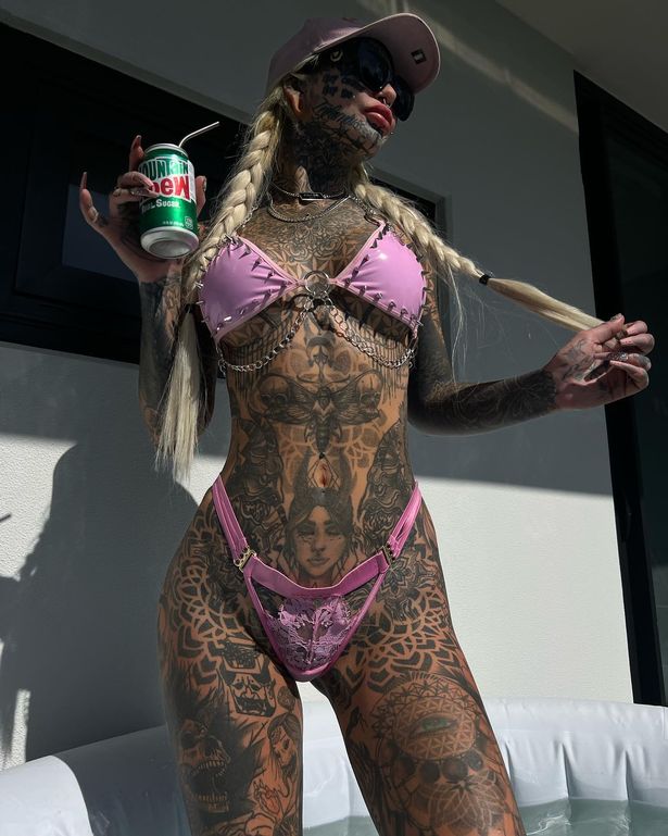 Amber Luke Flaunts Tattoo That Covers Of Her Body